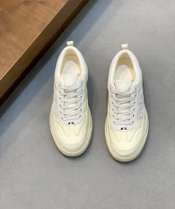 Luxus Moncler Turnschuhe einteiliges gesticktes gesticktes Kunststoff Zunge