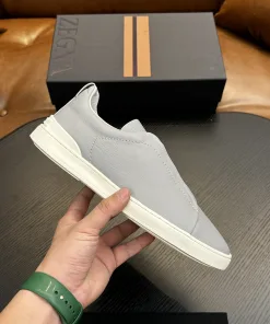 Hochwertige Zegna Lederschuhe. Diese Sneaker haben einen modernen