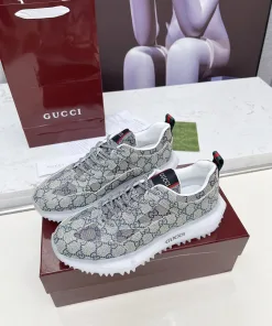 Luxus Gucci Turnschuhe Real Price Ikonische gestreifte Gurtbandelemente